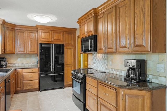 500 Mackubin Cir, Shoreview, MN 55126 - kitchen with black appliances, light tile patterned floors, tasteful backsplash, and brown cabinetry