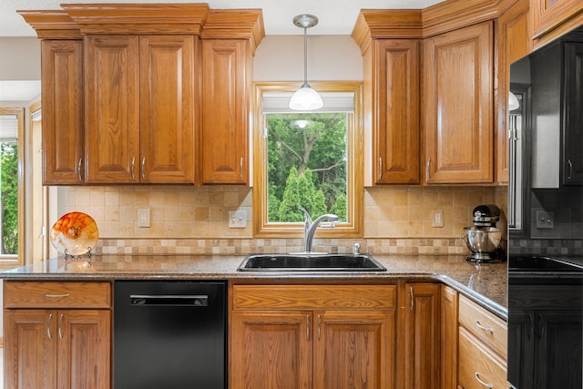 500 Mackubin Cir, Shoreview, MN 55126 - kitchen featuring dishwashing machine, a sink, healthy amount of natural light, and brown cabinets