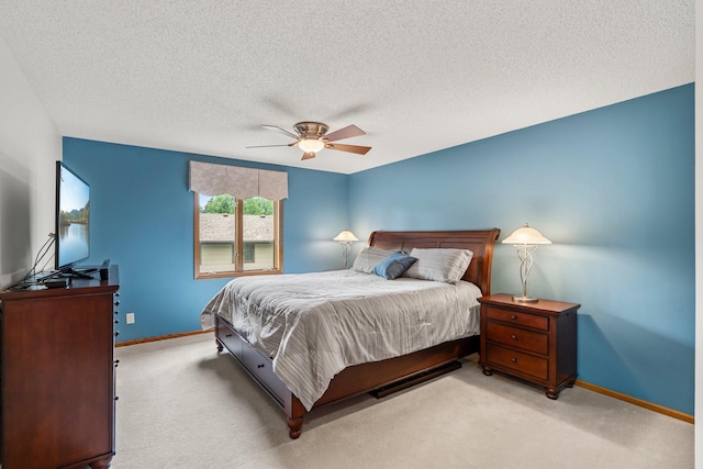 500 Mackubin Cir, Shoreview, MN 55126 - bedroom featuring baseboards, carpet, a textured ceiling, and ceiling fan