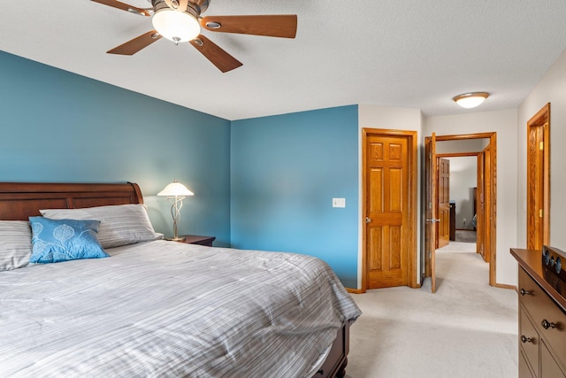 500 Mackubin Cir, Shoreview, MN 55126 - bedroom with light colored carpet and ceiling fan