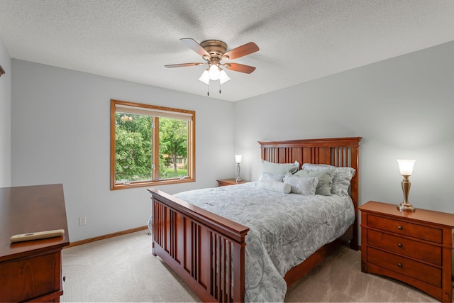 500 Mackubin Cir, Shoreview, MN 55126 - bedroom featuring light colored carpet, baseboards, a ceiling fan, and a textured ceiling