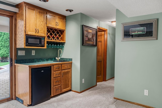 500 Mackubin Cir, Shoreview, MN 55126 - indoor wet bar featuring black microwave, light colored carpet, refrigerator, baseboards, and a textured ceiling