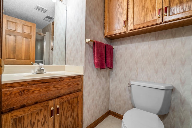 500 Mackubin Cir, Shoreview, MN 55126 - bathroom with wallpapered walls, toilet, vanity, a shower stall, and baseboards