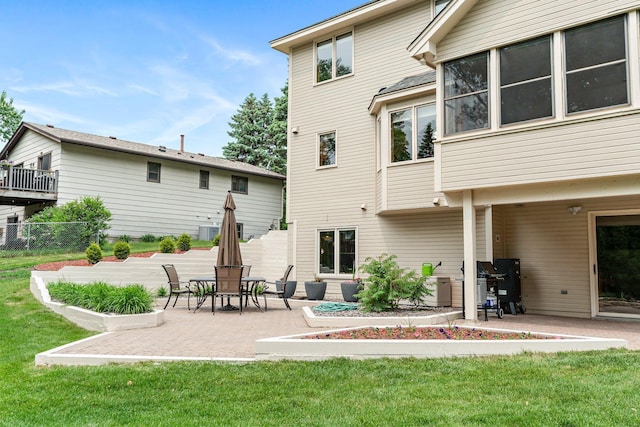 500 Mackubin Cir, Shoreview, MN 55126 - back of property with a patio