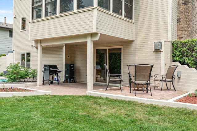 500 Mackubin Cir, Shoreview, MN 55126 - back of property featuring a patio area and a lawn