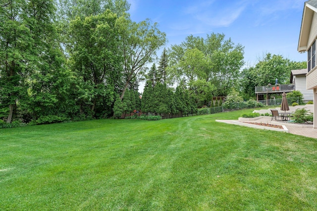 500 Mackubin Cir, Shoreview, MN 55126 - view of yard featuring a patio area