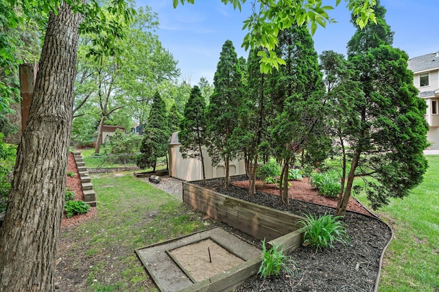 500 Mackubin Cir, Shoreview, MN 55126 - view of green lawn featuring an outdoor structure