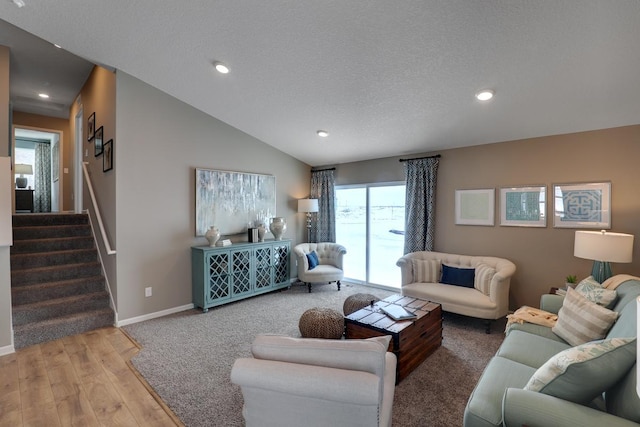 living area featuring light wood-style flooring, stairs, recessed lighting, baseboards, and lofted ceiling