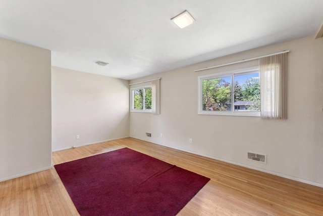 6300 Brooklyn Dr, Brooklyn Center, MN 55430 - empty room with wood finished floors and baseboards