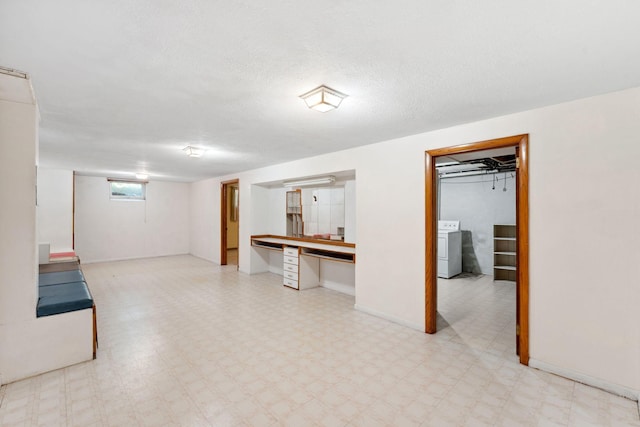 6300 Brooklyn Dr, Brooklyn Center, MN 55430 - below grade area with tile patterned floors, washer / dryer, and baseboards