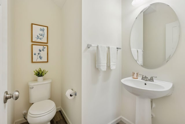 9675 Toledo Ln N, Brooklyn Park, MN 55443 - bathroom with toilet and baseboards