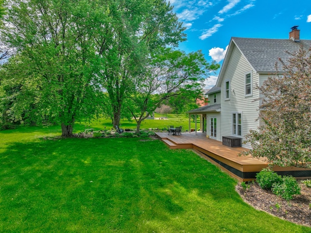 8632 Neal Ave S, Denmark Twp, MN 55033 - view of grassy yard featuring a deck