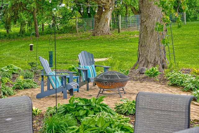 8632 Neal Ave S, Denmark Twp, MN 55033 - view of patio / terrace featuring an outdoor fire pit