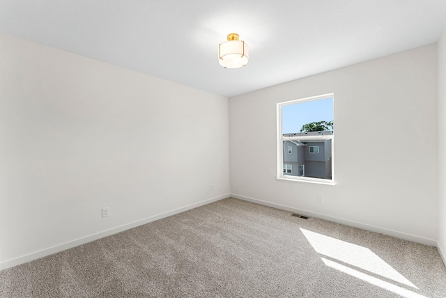 13430 Cadogan Way, Rosemount, MN 55068 - empty room featuring carpet floors and baseboards