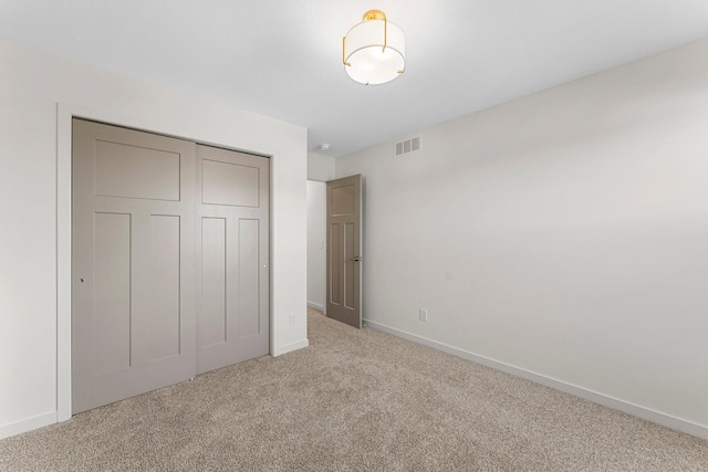 13430 Cadogan Way, Rosemount, MN 55068 - unfurnished bedroom with carpet floors, a closet, and baseboards