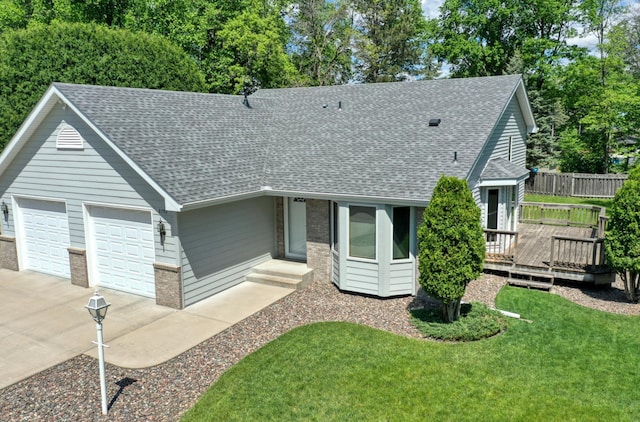 8790 212th St N, Forest Lake, MN 55025 - single story home featuring roof with shingles, driveway, an attached garage, a wooden deck, and brick siding