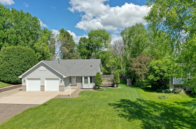 8790 212th St N, Forest Lake, MN 55025 - view of front facade with driveway, a front lawn, an attached garage, a shingled roof, and brick siding