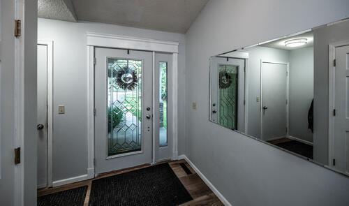 2211 Douglynn Ln, Saint Paul, MN 55119 - entryway featuring wood finished floors and baseboards