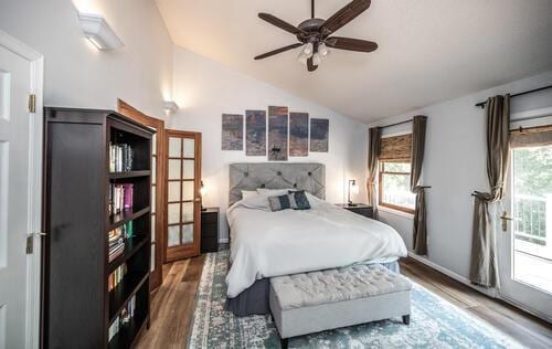 2211 Douglynn Ln, Saint Paul, MN 55119 - bedroom featuring lofted ceiling, wood finished floors, and access to exterior