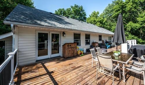 2211 Douglynn Ln, Saint Paul, MN 55119 - wooden deck with french doors and outdoor dining space
