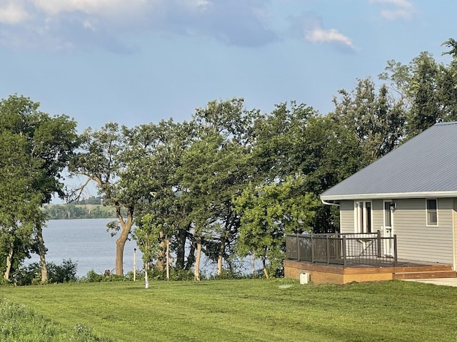 22 Jayvee Ln, Lake Sarah Twp, MN 56132 - view of grassy yard featuring a deck with water view