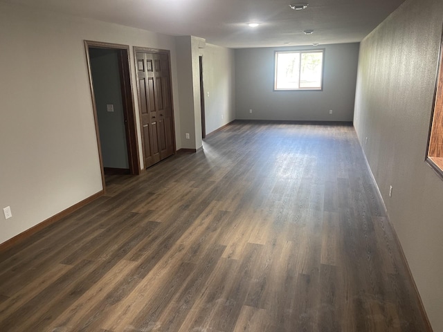 22 Jayvee Ln, Lake Sarah Twp, MN 56132 - spare room featuring dark wood-style floors and baseboards