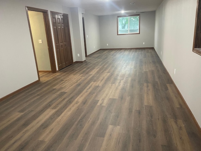 22 Jayvee Ln, Lake Sarah Twp, MN 56132 - spare room featuring dark wood-style flooring and baseboards