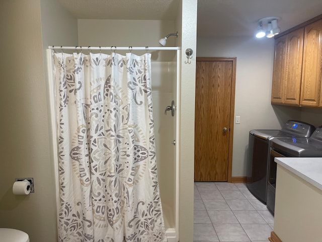 22 Jayvee Ln, Lake Sarah Twp, MN 56132 - laundry room with washer and dryer and light tile patterned floors