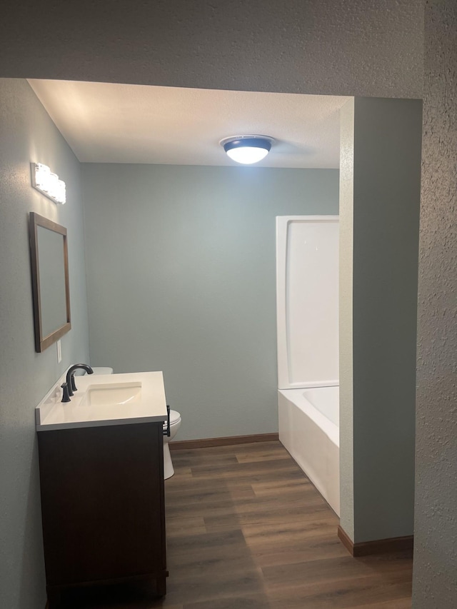 22 Jayvee Ln, Lake Sarah Twp, MN 56132 - full bath with vanity, wood finished floors, a bath, and a shower