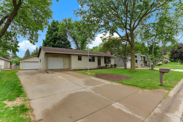 1115 14th St W, Hastings, MN 55033 - ranch-style house with a garage and a front lawn