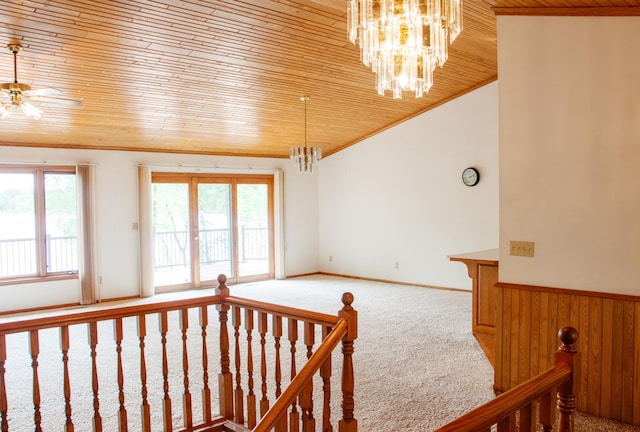 32682 S Bay Ln, Breezy Point, MN 56472 - carpeted spare room with wooden ceiling, a chandelier, healthy amount of natural light, ornamental molding, and ceiling fan