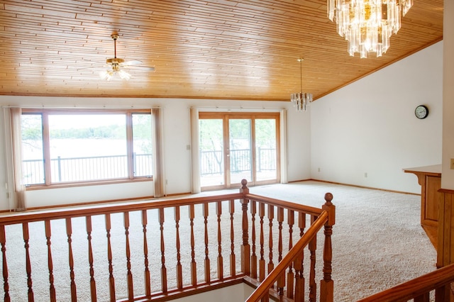 32682 S Bay Ln, Breezy Point, MN 56472 - unfurnished room with wood ceiling, a chandelier, carpet floors, ornamental molding, and vaulted ceiling