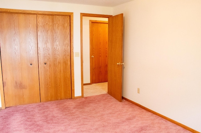 32682 S Bay Ln, Breezy Point, MN 56472 - unfurnished bedroom featuring a closet and carpet