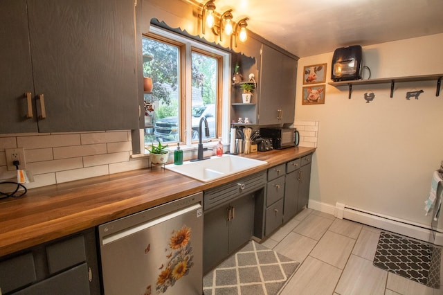 kitchen with dishwasher, open shelves, a sink, and wooden counters