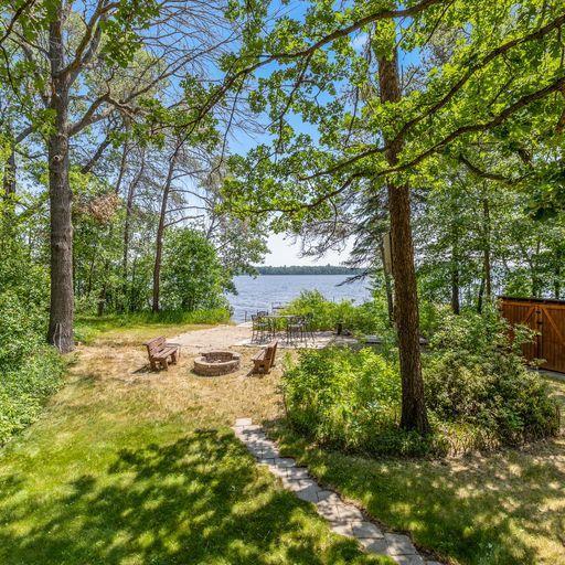 24752 County Road 3, Center Twp, MN 56465 - view of yard featuring an outdoor fire pit and a water view