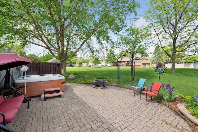 1665 Royal Oak Dr, Chaska, MN 55318 - view of patio / terrace with a hot tub and a fire pit