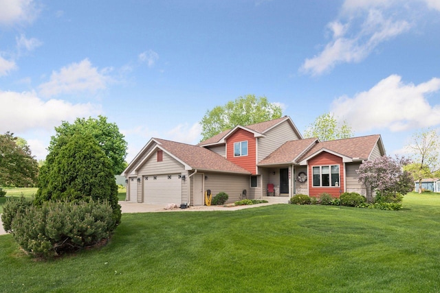 1665 Royal Oak Dr, Chaska, MN 55318 - view of front facade featuring an attached garage, a shingled roof, a front lawn, and driveway
