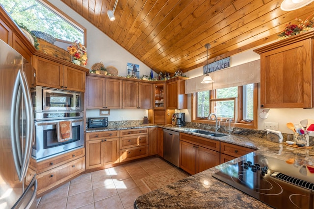 36737 Shoreview Dr, Wabana Twp, MN 55744 - kitchen featuring appliances with stainless steel finishes, a sink, brown cabinets, light tile patterned floors, and wood ceiling