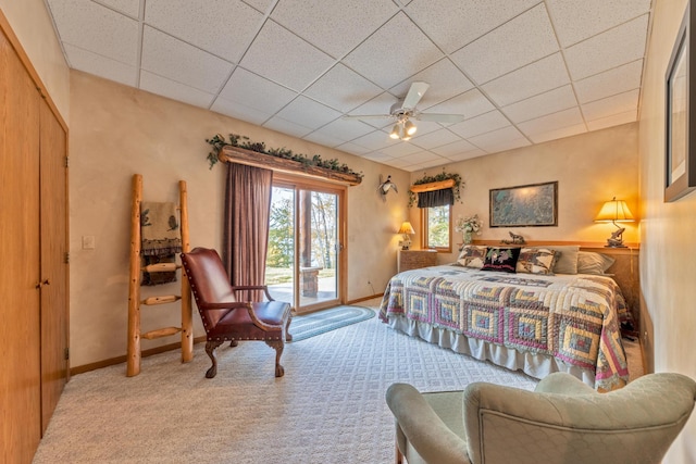 36737 Shoreview Dr, Wabana Twp, MN 55744 - bedroom with access to outside, carpet flooring, a drop ceiling, baseboards, and a ceiling fan