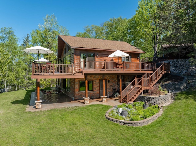 36737 Shoreview Dr, Wabana Twp, MN 55744 - rear view of house with a wooden deck, a patio area, and a yard