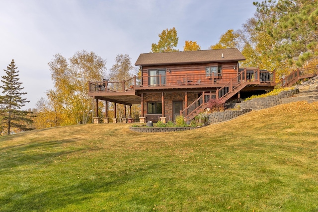 36737 Shoreview Dr, Wabana Twp, MN 55744 - back of house featuring a wooden deck, stairway, and a yard