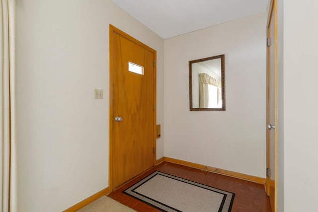 706 9th Ave SW, Faribault, MN 55021 - foyer featuring baseboards and plenty of natural light