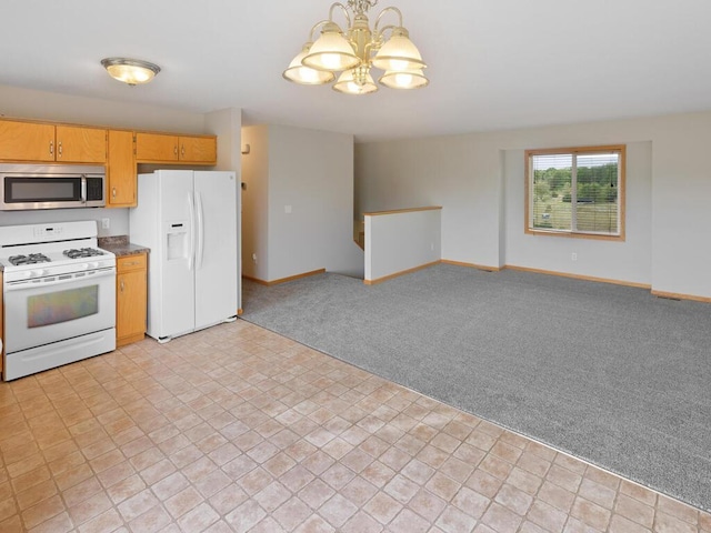 11023 171st Ave SE, Becker, MN 55308 - kitchen with white appliances, light colored carpet, a chandelier, baseboards, and dark countertops