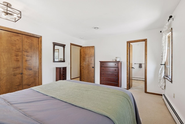 7012 Sally Ln, Edina, MN 55439 - bedroom featuring baseboard heating, light carpet, and a closet