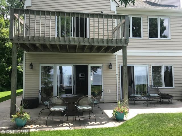 8012 Par Five Dr, South Harbor Twp, MN 56359 - rear view of property featuring a balcony and a patio area