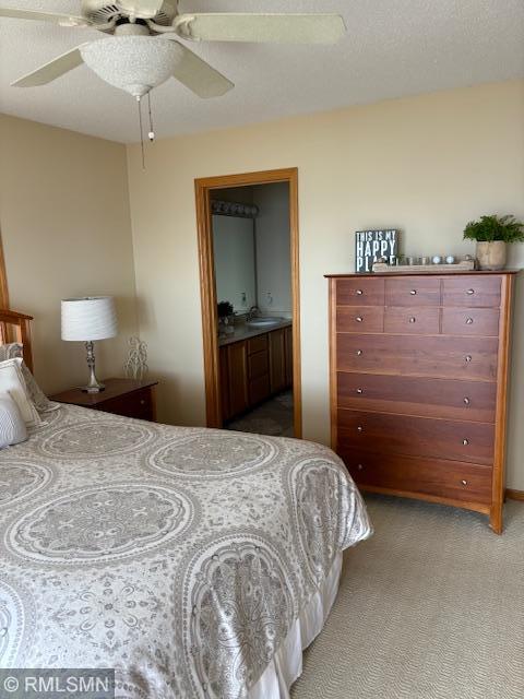 8012 Par Five Dr, South Harbor Twp, MN 56359 - bedroom featuring carpet flooring, ensuite bath, and a ceiling fan