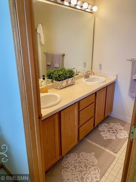 8012 Par Five Dr, South Harbor Twp, MN 56359 - full bathroom featuring double vanity and tile patterned floors
