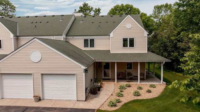 8012 Par Five Dr, South Harbor Twp, MN 56359 - view of front facade featuring a shingled roof, a garage, and a front lawn