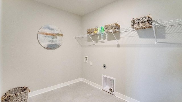6562 208th St W, Farmington, MN 55024 - clothes washing area with washer hookup, electric dryer hookup, baseboards, and light floors