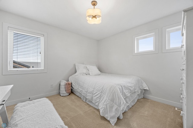 508 13th St NE, Dilworth, MN 56529 - bedroom with baseboards and carpet